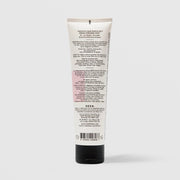 Back of SEEN Blow-Out Creme tube showing usage instructions, ingredient claims, and bilingual English and French text, against a light gray background.