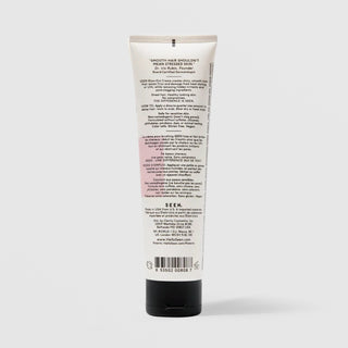 Back of SEEN Blow-Out Creme tube showing usage instructions, ingredient claims, and bilingual English and French text, against a light gray background.