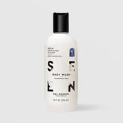 SEEN Fragrance Free Body Wash (10 fl oz / 296 ml) in a white bottle with black flip cap and bold black SEEN lettering, labeled dermatologist developed and safe for sensitive skin, with a National Eczema Association accepted seal, displayed against a light gray background.