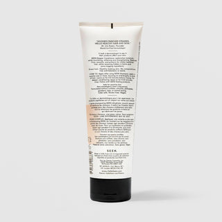 Back of SEEN Deeper Conditioner tube showing usage instructions, ingredient claims, and bilingual English and French text, against a light gray background.