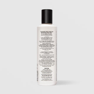 Back of SEEN Fragrance Free Conditioner bottle showing usage instructions, ingredient claims, and bilingual English and French text, against a light gray background