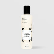 SEEN Fragrance Free Skin-Caring Shampoo (8.6 fl oz) in a white bottle with black flip cap and bold black SEEN lettering, labeled dermatologist designed, non-comedogenic, and suitable for all hair types, displayed against a light gray background.