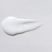 Skin Script Blemish Spot Treatment texture swatch showing smooth opaque white cream with lightweight fluid consistency. Available at Art of Skin Care