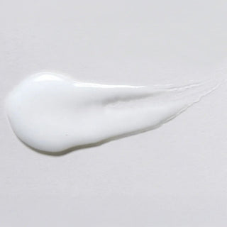 Skin Script Blemish Spot Treatment texture swatch showing smooth opaque white cream with lightweight fluid consistency. Available at Art of Skin Care