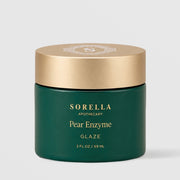 Sorella Apothecary Pear Enzyme Glaze 2 fl oz in a deep green jar with gold embossed lid on a light gray 