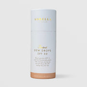 Sorella Apothecary Tinted Dew Drops SPF 50 1 fl oz in a white cylindrical box with light tan tint shade indicator on a light gray background