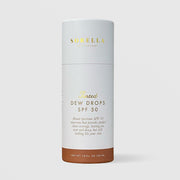 Sorella Apothecary Tinted Dew Drops SPF 50 1 fl oz in a white cylindrical box with deep tan tint shade indicator on a light gray background