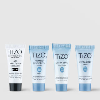 TiZO mineral sunscreen sampler set with four mini tubes including AM Replenish Lightly Tinted TiZO3 Primer Tinted Ultra Zinc Non-Tinted and Ultra Zinc Tinted SPF 40